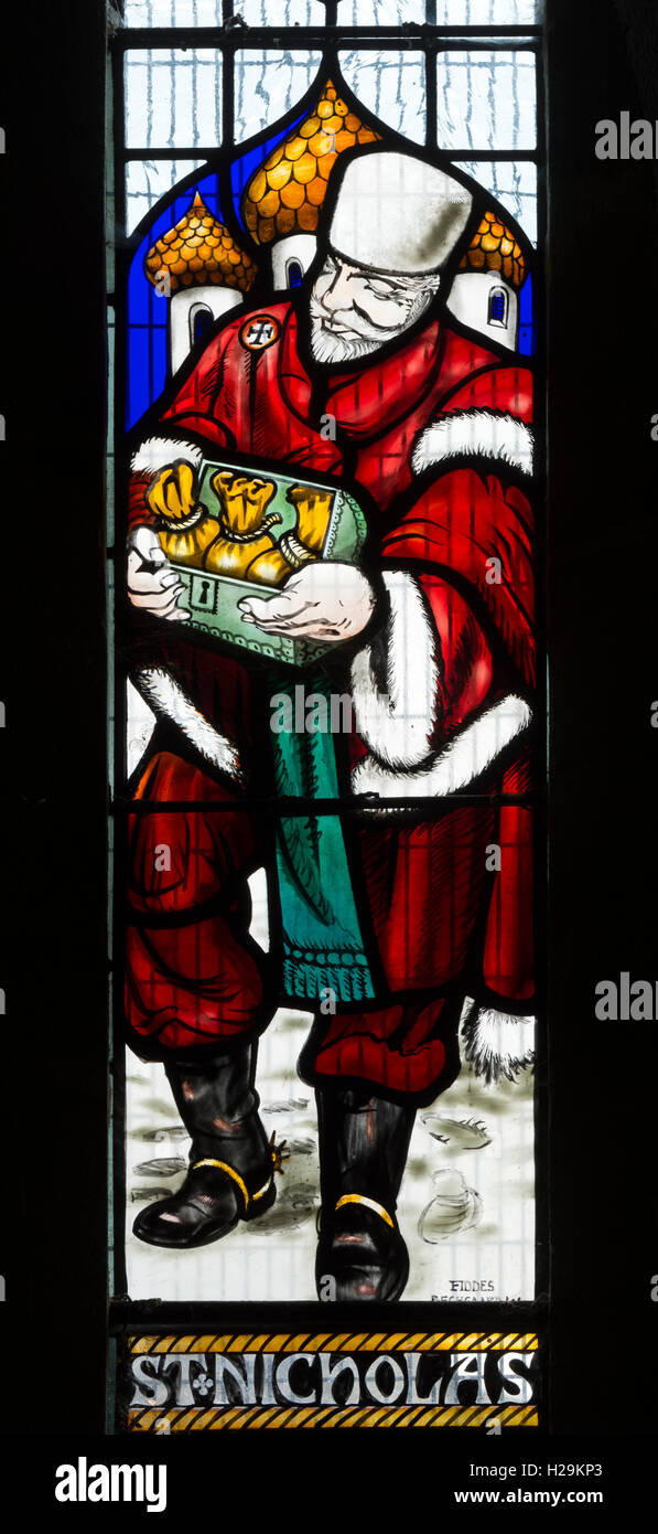 Saint Nicholas stained glass, St. Bartholomew`s Church, Ducklington, Oxfordshire, England, UK Stock Photo